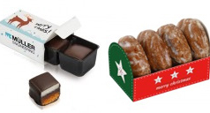 Domino-Steine in einer individuell bedruckten Papp-Verpackung und kleine Oblaten-Lebkuchen im individuell gestalten Werbe-Schuber.